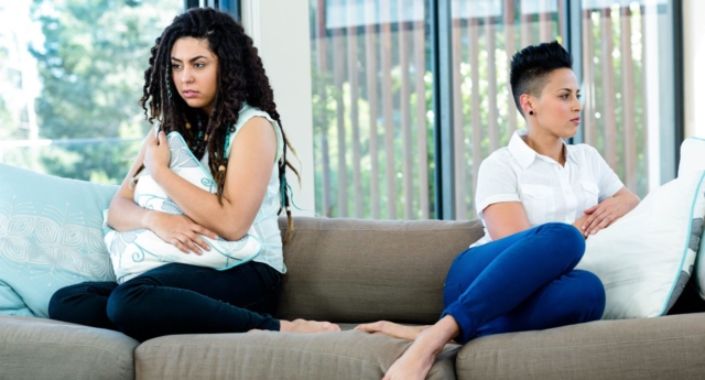 Bigstock-99212854-Unhappy-lesbian-couple-sitting-on-sofa-in-living-room_640x345_acf_cropped.jpg