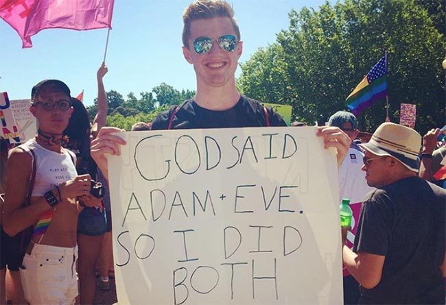 "God said Adam and Eve so I did both" Pride sign 2017