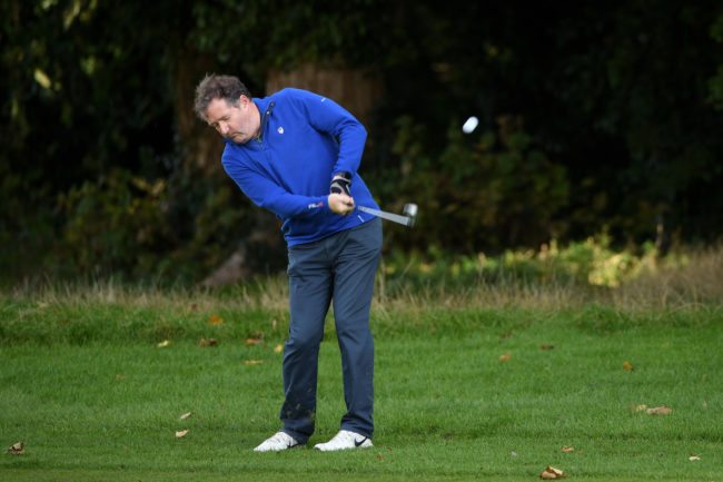 WATFORD, ENGLAND - OCTOBER 12: Journalist Piers Morgan plays a shot on the sixth hole during the Hero Pro-Am at The Grove on October 12, 2016 in Watford, England. (Photo by Ross Kinnaird/Getty Images)