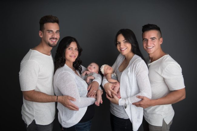 Mothers Mariely Martinez,left, and Carla Melendez, right with fathers Juny Roman and Alex Torres and newborns Marla and Matteo
