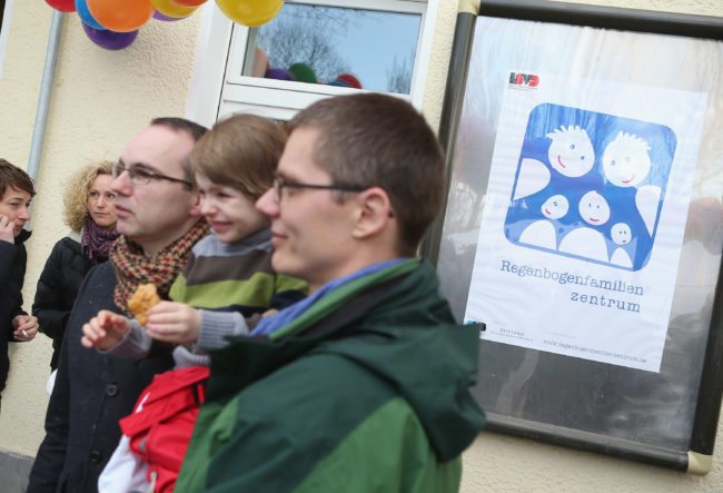 BERLIN, GERMANY - MARCH 15:  Gay couple Kai (L) and Michael Korok and their daughter Jana, 4, attend the opening of Germany's first gay parent counseling center on March 15, 2013 in Berlin, Germany. The Regenbogenfamilien Zentrum (Rainbow Families Center) will provide counseling and other services to families with gay, lesbian and transgender parents. Gay marriage is legal in Germany though gay couples are not entitled to the same full legal rights as heterosexual couples, and the issue of child adoption by gay couples remains legally somewhat complicated.  (Photo by Sean Gallup/Getty Images)