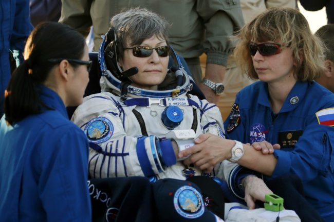 NASA medical staff members examine International Space Station (ISS) crew member US astronaut Peggy Whitson shortly after she landed in a remote area outside the town of Dzhezkazgan (Zhezkazgan), Kazakhstan on September 3, 2017. US astronaut Peggy Whitson touched down to Earth on September 3 with two Russian and American colleagues following her record-breaking 288-day stay at the International Space Station. / AFP PHOTO / POOL / SERGEI ILNITSKY (Photo credit should read SERGEI ILNITSKY/AFP/Getty Images)