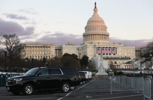 WASHINGTON, DC - JANUARY 18:  Vehicles are lined up in front of the U.S. Capitol building ahead of inauguration ceremonies for President-elect Donald Trump on January 18, 2017 in Washington, DC. Trump will be sworn in as the 45th U.S, president on January 20.  (Photo by Mario Tama/Getty Images)