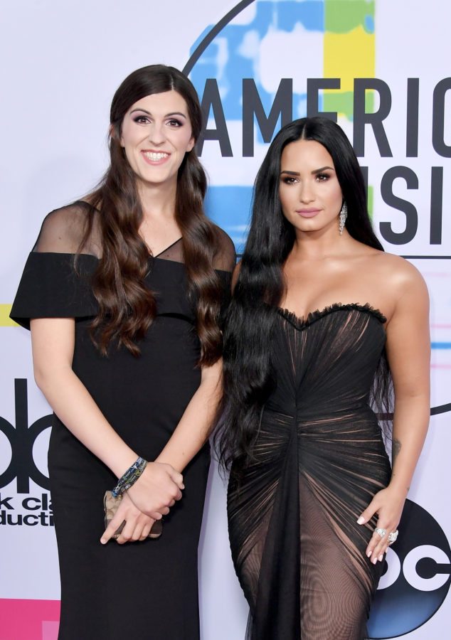 LOS ANGELES, CA - NOVEMBER 19: Danica Roem (L) and Demi Lovato attends the 2017 American Music Awards at Microsoft Theater on November 19, 2017 in Los Angeles, California. (Photo by Neilson Barnard/Getty Images)