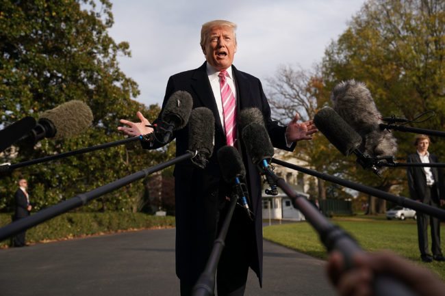 WASHINGTON, DC - NOVEMBER 21:  U.S. President Donald Trump talks to reporters as he departs the White House November 21, 2017 in Washington, DC. Trump and his family are going to his Mar-a-Lago resort for the Thanksgiving holiday.  (Photo by Chip Somodevilla/Getty Images)