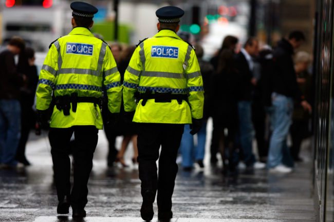 GLASGOW, UNITED KINGDOM - DECEMBER 07: Police officers patrol Buchanan Street in Glasgow, December 7, 2007 in Scotland.There is growing anger as Scotland's police officers will receive a larger pay rise than their colleagues in England and Wales. (Photo by Jeff J Mitchell/Getty Images)