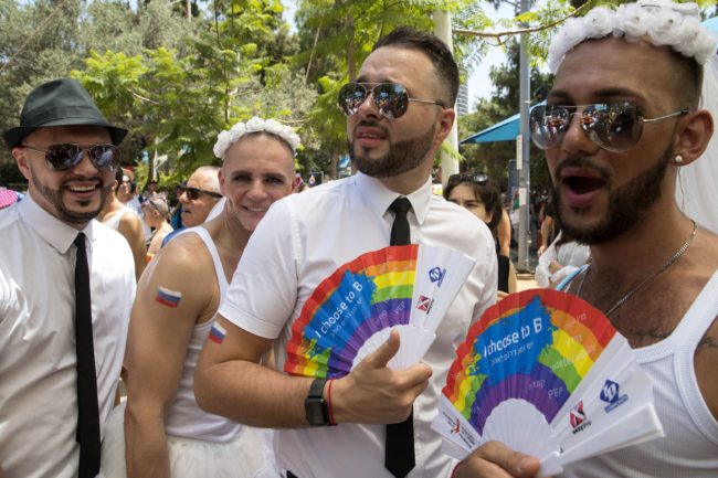 Russians take part in the annual Gay Pride parade in the Israeli city of Tel Aviv, on June 9, 2017.  Tens of thousands of revellers from Israel and abroad packed the streets of Tel Aviv for the city's annual Gay Pride march, billed as the Middle East's biggest. / AFP PHOTO / JACK GUEZ        (Photo credit should read JACK GUEZ/AFP/Getty Images)