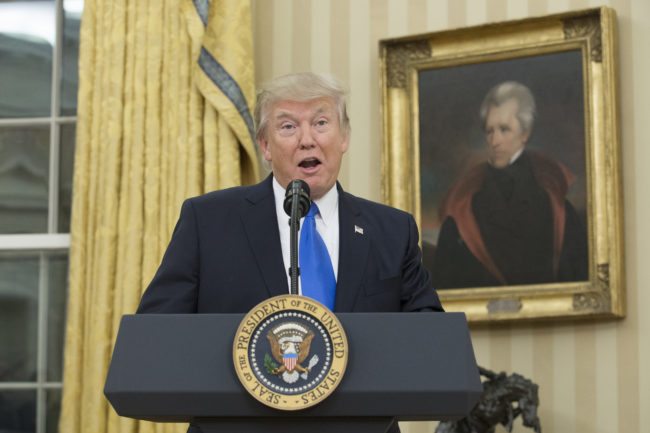 WASHINGTON, DC - FEBRUARY 1:  (AFP OUT) U.S. President Donald Trump, beneath a portrait of populist President Andrew Jackson, speaks before the swearing-in of Rex Tillerson as 69th secretary of state in the Oval Office of the White House on February 1, 2017 in Washington, DC. Tillerson was confirmed by the Senate earlier in the day in a 56-43 vote.  (Photo by Michael Reynolds-Pool/Getty Images)
