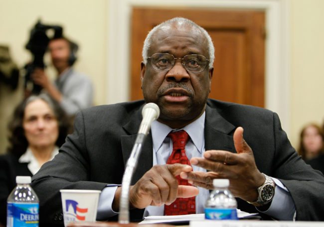 WASHINGTON - APRIL 15:  U.S. Supreme Court Justice Clarence Thomas testifies during a hearing before the Financial Services and General Government Subcommittee of the House Appropriations Committee April 15, 2010 on Capitol Hill in Washington, DC. The hearing was to examine the FY2011 budget request for the Supreme Court.  (Photo by Alex Wong/Getty Images)