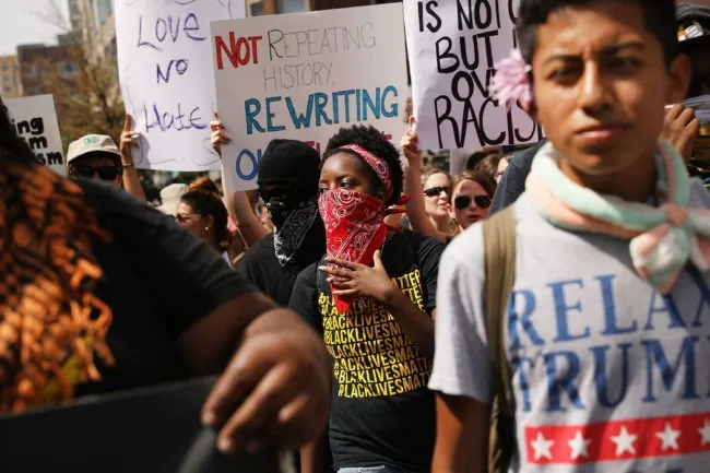 BOSTON, MA - AUGUST 19:  Thousands of protesters march in Boston against a planned 'Free Speech Rally' just one week after the violent 'Unite the Right' rally in Virginia left one woman dead and dozens more injured on August 19, 2017 in Boston, United States. Although the rally organizers stress that they are not associated with any alt-right or white supremacist groups, the city of Boston and Police Commissioner William Evans are preparing for possible confrontations at the afternoon rally.  (Photo by Spencer Platt/Getty Images)