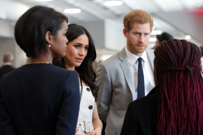 Britain's Prince Harry (R) and his fiancee, US actress Meghan Markle, attend a reception with delegates from the Commonwealth Youth Forum in central London on April 18, 2017, on the sidelines of the Commonwealth Heads of Government meeting (CHOGM). / AFP PHOTO / POOL / Yui Mok (Photo credit should read YUI MOK/AFP/Getty Images)