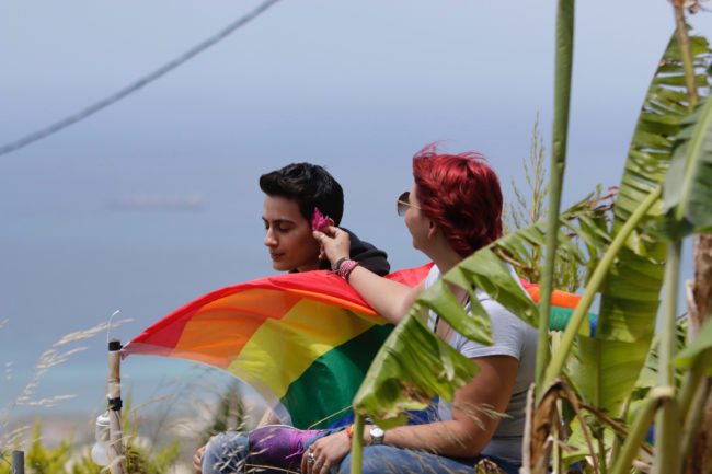 Members of Lebanon's LGBTQ community attend a picnic the coastal city of Batroun, north of Beirut, on May 21, 2017, as part of the Beirut Pride week aimed at raising awarness about the rights of the community. / AFP PHOTO / IBRAHIM CHALHOUB        (Photo credit should read IBRAHIM CHALHOUB/AFP/Getty Images)
