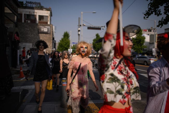 TOPSHOT - In a photo taken on May 26, 2018 participants of the 'Seoul Drag Parade' march in the Itaewon district of Seoul. - South Korea held its first ever drag parade this weekend, a small but significant step for rights activists in a country that remains deeply conservative when it comes to gender and sexuality. (Photo by Ed JONES / AFP) (Photo credit should read ED JONES/AFP/Getty Images)
