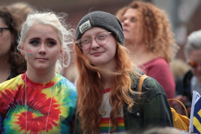 COLUMBUS, IN - APRIL 14: Erin Bailey (R) watches the drag show at the Columbus Pride Festival on April 14, 2018 in Columbus, Indiana. The festival was the first LGBT pride event for the community which is the hometown of Vice President Mike Pence, a vocal opponent of LGBT issues. Bailey, a high school senior, organized the festival which drew hundreds of visitors to the small community located about 45 miles south of Indianapolis. (Photo by Scott Olson/Getty Images)