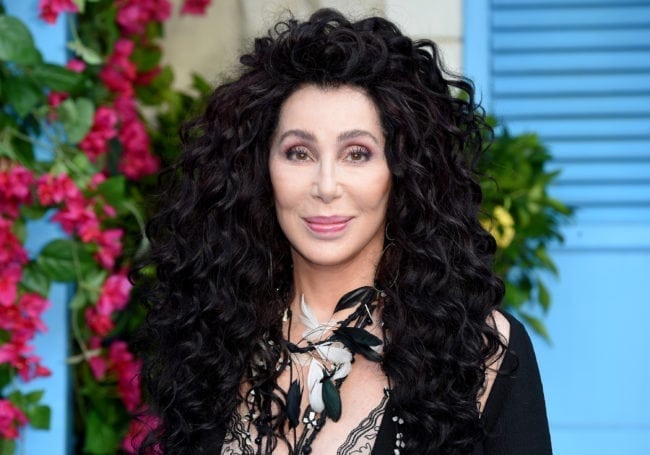 Cher poses on the red carpet upon arrival for the world premiere of the film "Mamma Mia! Here We Go Again" in London on July 16, 2018. (ANTHONY HARVEY/AFP/Getty)