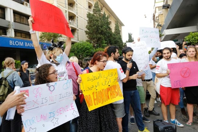 Activists from of the Lebanese LGBT community take part in a protest outside the Hbeish police station in Beirut on May 15, 2016, demanding the release of four transsexual women and calling for the abolishment of article 534 of the Lebanese Penal code, which prohibits having sexual relations that "contradict the laws of nature". / AFP / ANWAR AMRO        (Photo credit should read ANWAR AMRO/AFP/Getty Images)