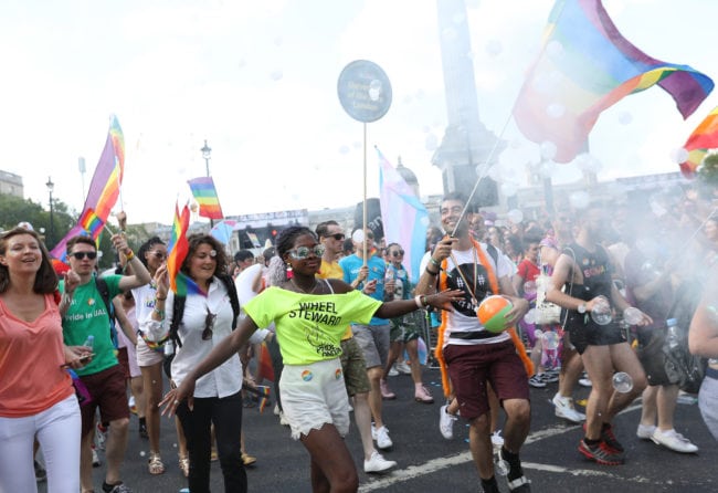 LONDON, ENGLAND - JULY 07:  Parade goers in Trafalgar Square during Pride In London on July 7, 2018 in London, England. It is estimated over 1 million people will take to the streets and approximately 30,000 people and 472 organisations will join the annual parade, which is one of the world's biggest LGBT+ celebrations.  