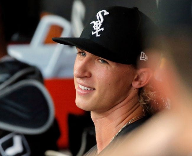CHICAGO, IL - AUGUST 21: Michael Kopech #34 of the Chicago White Sox smiles while sitting in the dugout before the game against the Minnesota Twins at Guaranteed Rate Field on August 21, 2018 in Chicago, Illinois.  (Photo by Jon Durr/Getty Images)