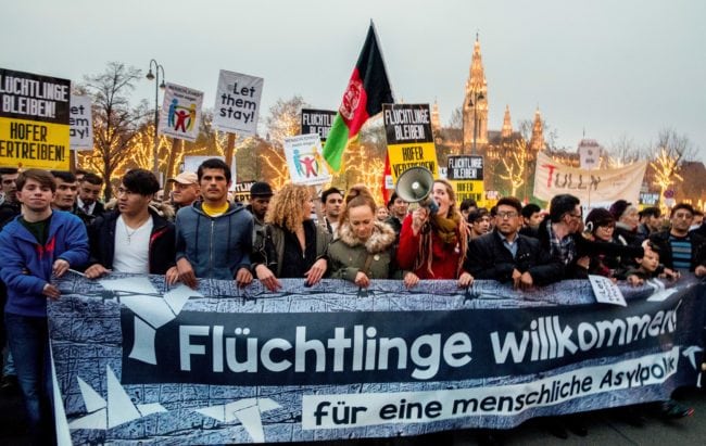 Austrian citizens and asylum seekers march during a pro-refugee protest called "Let them stay" in Vienna, Austria on November 26, 2016.  Austria will hold the postponed second round of the presidential elections on December 4, 2016. / AFP / JOE KLAMAR        (Photo credit should read JOE KLAMAR/AFP/Getty Images)