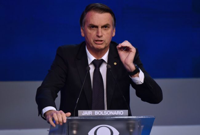 Brazilian presidential candidate Jair Bolsonaro (PSL), speaks during the first presidential debate ahead of the October 7 general election, at Bandeirantes television network in Sao Paulo, Brazil, on August 9, 2018. (Photo by Nelson ALMEIDA / AFP) (Photo credit should read NELSON ALMEIDA/AFP/Getty Images)