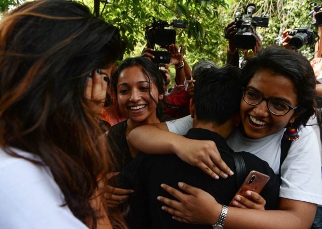 Indian members of the lesbian, gay, bisexual, transgender (LGBT) community celebrate outside the Supreme Court after the decision to strike down the colonial-era ban on gay sex in New Delhi on September 6, 2018. - India's Supreme Court on September 6 struck down the ban that has been at the centre of years of legal battles. "The law had become a weapon for harassment for the LGBT community," Chief Justice Dipak Misra said as he announced the landmark verdict. (Photo by Sajjad HUSSAIN / AFP) (Photo credit should read SAJJAD HUSSAIN/AFP/Getty Images)