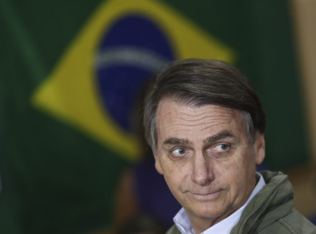 Jair Bolsonaro, far-right lawmaker and presidential candidate, casts his vote in October