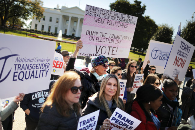 WASHINGTON, DC - OCTOBER 22: L.G.B.T. activists from the National Center for Transgender Equality, partner organizations and their supporters hold a 'We Will Not Be Erased' rally in front of the White House October 22, 2018 in Washington, DC. Members of the L.G.B.T. community and their supporters across the country mobilized quickly to show support for Transgender rights after the New York Times published news of an unreleased Trump administration memo that proposes a strict definition of gender based on a person’s genitalia at birth. (Photo by Chip Somodevilla/Getty Images)