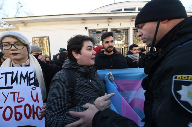 Trans rights rally participants protest the police's decision to disperse demonstrators.