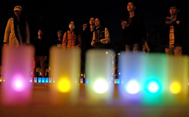 Supporters of the transgender community in Taiwan light candles during the Transgender Day of Remembrance in 2014.