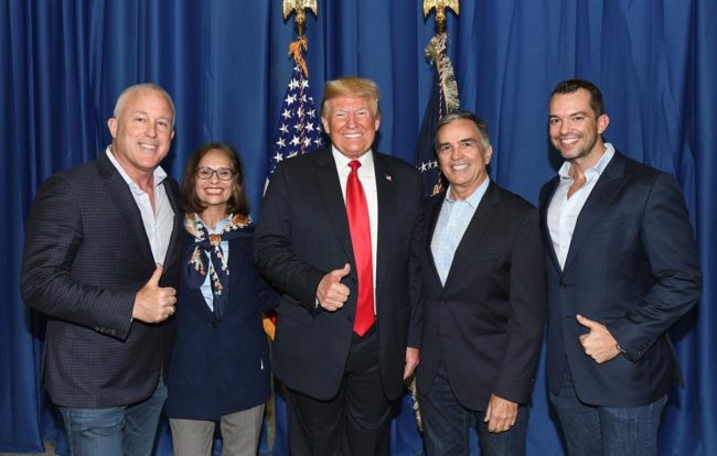 Donald Trump poses with Byan Eure and his husband Bill White