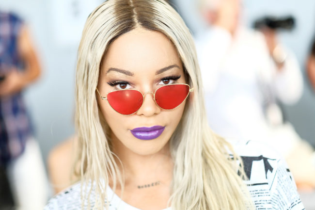 Munroe Bergdorf attends the Nana Judy front row during New York Fashion Week