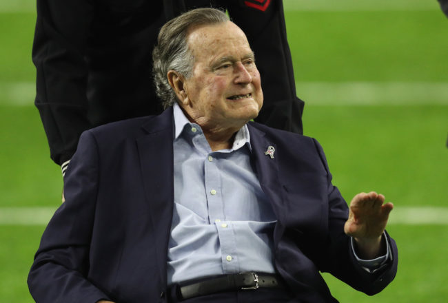 President George H.W. Bush arrives for the coin toss prior to Super Bowl 51 between the Atlanta Falcons and the New England Patriots at NRG Stadium on February 5, 2017 in Houston, Texas.