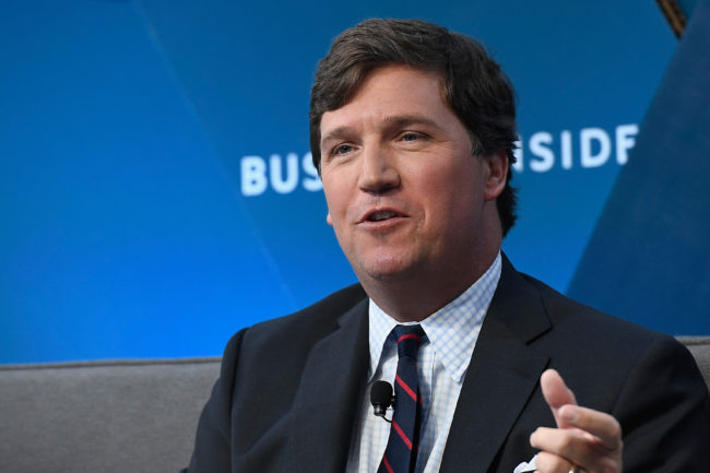 Tucker Carlson. Advertisers have pulled funding from Carlon's show after comments he made about immigrants 