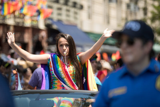 Parade grand marshall Jazz Jennings, 15-year-old honorary co-founder of the Transkids Purple Rainbow Foundation, rides in a car during the New York City Pride March, June 26, 2016