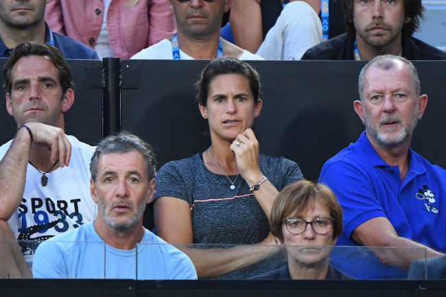 Amelie Mauresmo looks on in the men's semi final match between Novak Djokovic of Serbia and Lucas Pouille of France during day 12 of the 2019 Australian Open at Melbourne Park on January 25, 2019 in Melbourne, Australia.