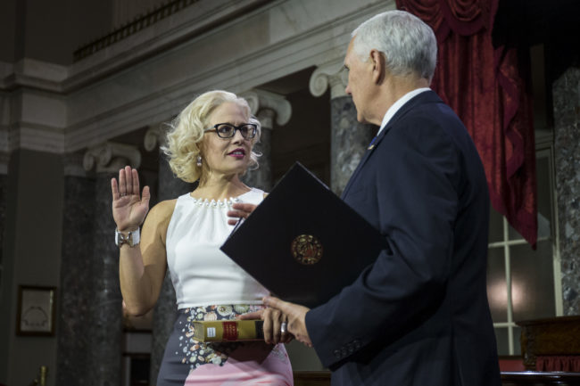 Senator Kyrsten Sinema participates in a swearing in ceremony with Vice President Mike Pence on Capitol Hill on January 3, 2019 in Washington, DC. 