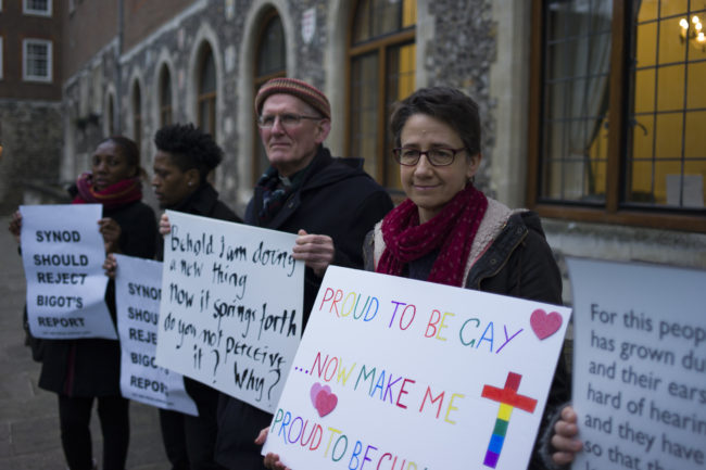 Members of the LGBT community stage a peaceful protest outside Church House on February 15, 2017 in London, England, where Church of England members were meeting