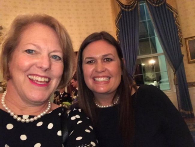 Ginni Thomas, wife of Supreme Court Justice Clarence Thomas, who met with Donald Trump at the White House in January 2019, smiles with Press Secretary Sarah Huckabee Sanders 