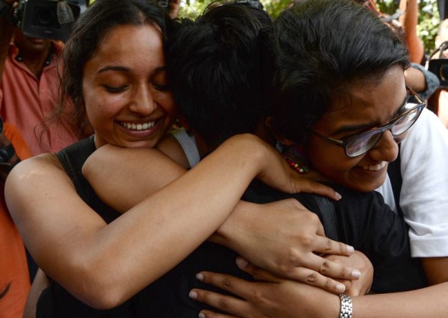 In India, members of the lesbian, gay, bisexual, transgender (LGBT) community celebrate outside the Supreme Court after the decision to strike down the colonial-era ban on gay sex in New Delhi on September 6 2018