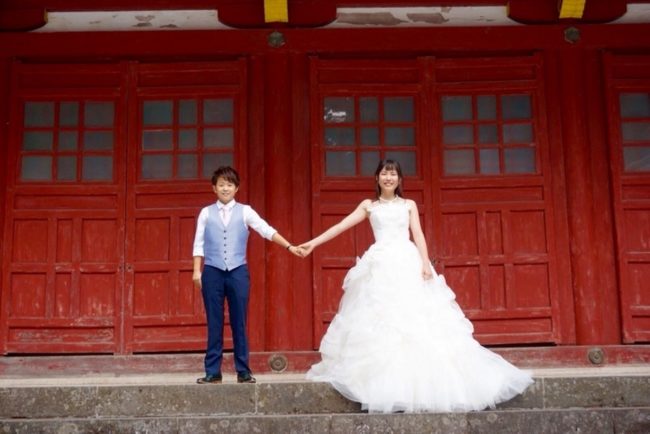 Lesbian couple Mayu Otaki (right) and Misato Kawasaki (left) pose for a wedding photo in Japan