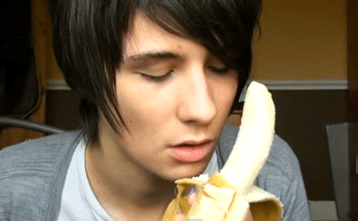 man licking a banana 