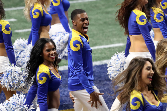 Los Angeles Rams cheerleader Quinton Peron performs during Super Bowl LIII against the New England Patriots at Mercedes-Benz Stadium on February 3, 2019 in Atlanta, Georgia. 