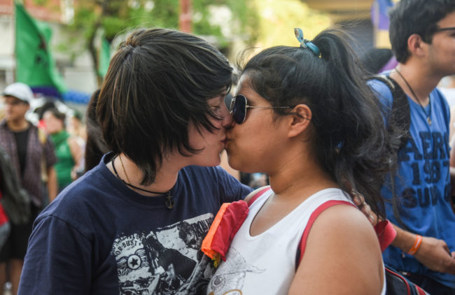 Gay sex is one of the rights expected by activists such as these people kissing during the 15th LGBTI March with the slogan "Memory, Pride and Resistance for LGBTI persons rights" in Asuncion, on September 29, 2018
