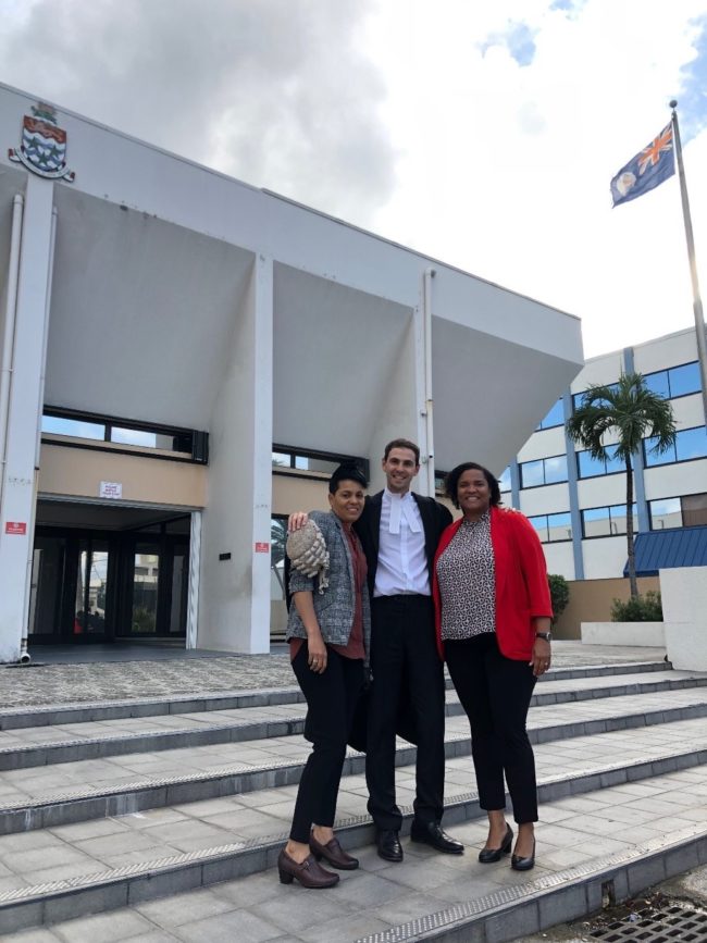 Chantelle Day, Peter Laverack, and Vickie Bodden Bush stand outside the court in the Cayman Island that legalised same-sex marriage on March 29.