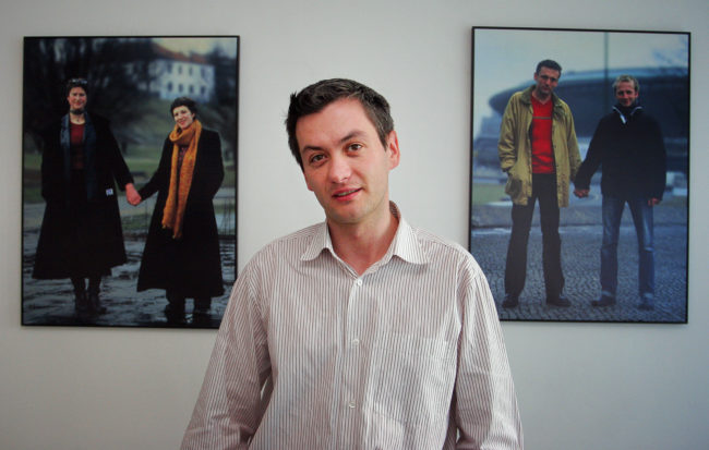 LGBT activist Robert Biedron poses in his office in Warsaw in June 2006. 