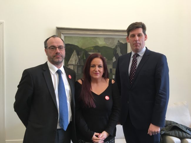 Cara McCann of HereNI and Patrick Corrigan of Amnesty International with Northern Ireland Office Minister, Lord Duncan of Springbank