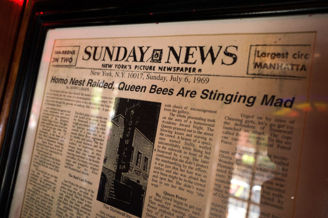 LGBT history: A newspaper from 1969 hangs in New York's Stonewall Inn, considered the birthplace of the modern gay rights movement, where patrons fought back against police persecution in 1969. 