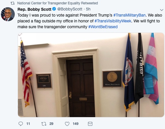 Several lawmakers announced their vote condemning Trump's transgender military ban in the bipartisan resolution posting a picture of the trans pride flag displayed outside their office. 