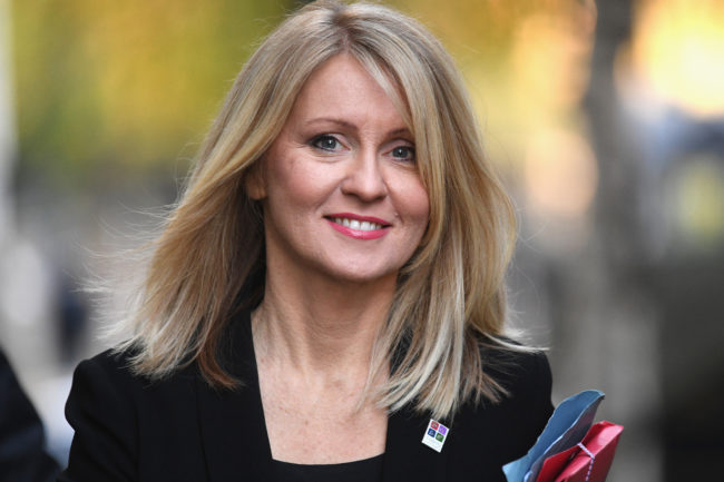 Esther McVey smiling as she walks in 10 Downing Street