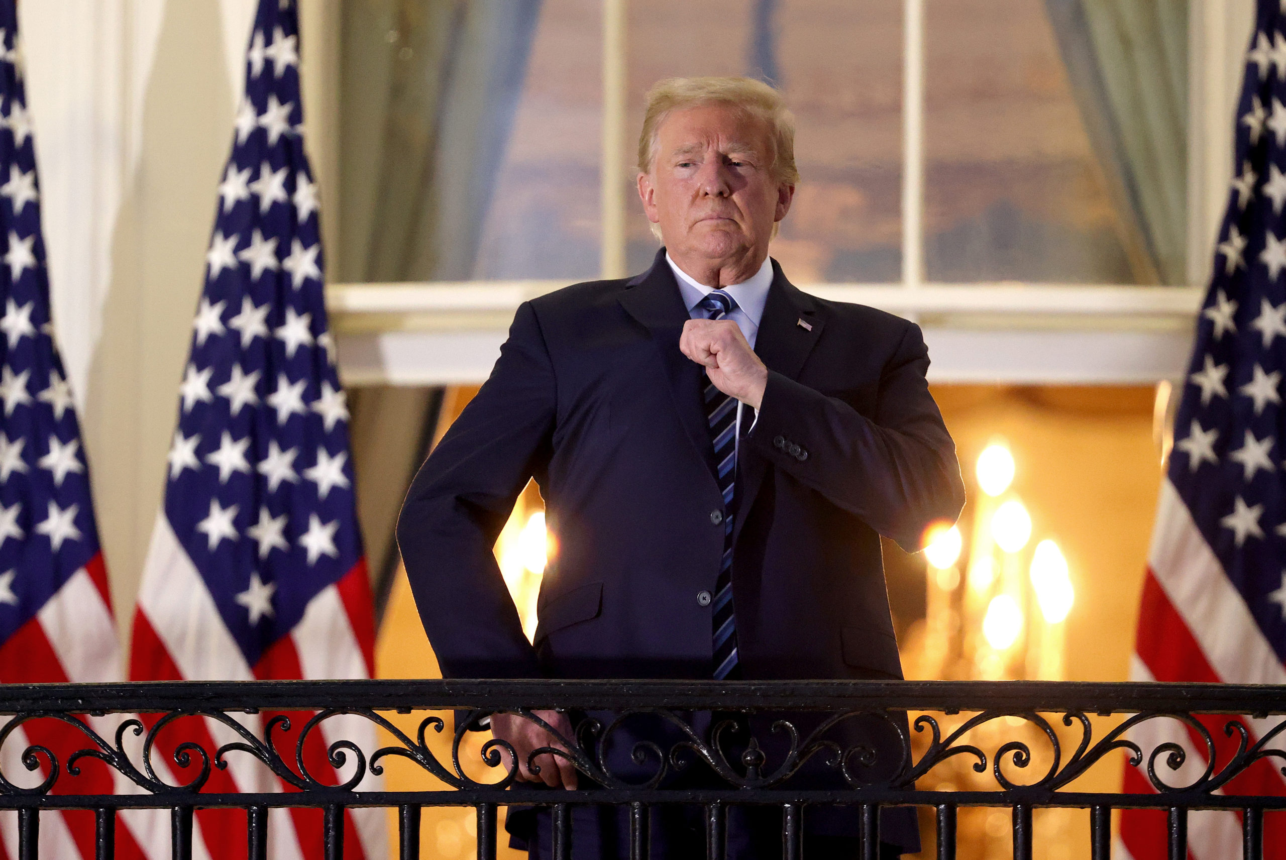 Evita: President Donald Trump gestures on the Truman Balcony after returning to the White House from Walter Reed National Military Medical Center on October 5 